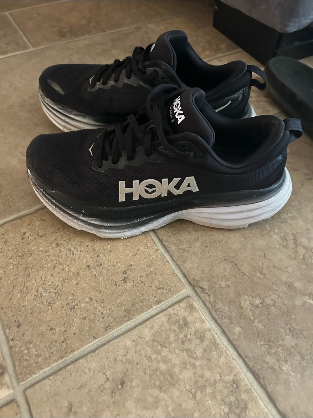 Hoka Women’s Black and White Athletic Running Shoes still good shoes
